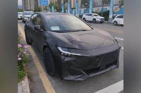 Toyota's new Corolla-sized EV sedan spied