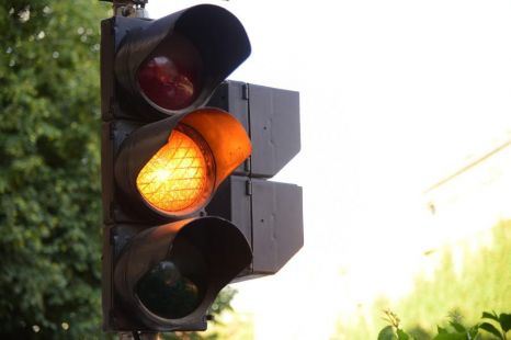 Can you be booked for running a yellow light?