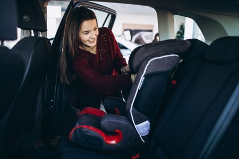 Is it legal for children to ride in a taxi without a child seat?