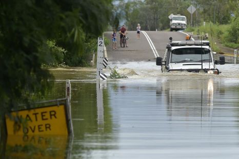 Is it illegal to drive in floodwaters or flooded roads?