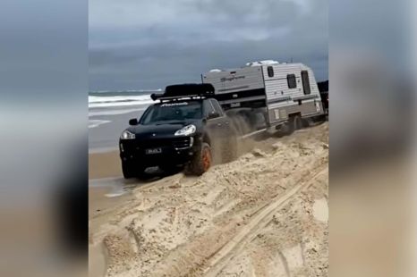 Porsche rescues big American pickup stuck on Aussie beach