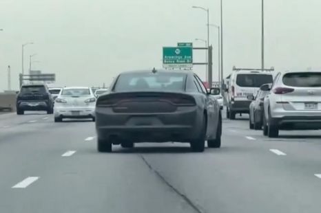 Damaged Dodge caught crabbing through traffic