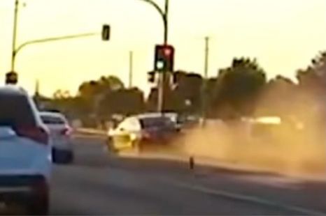 Melbourne motorcyclist run over in road rage incident caught on dashcam