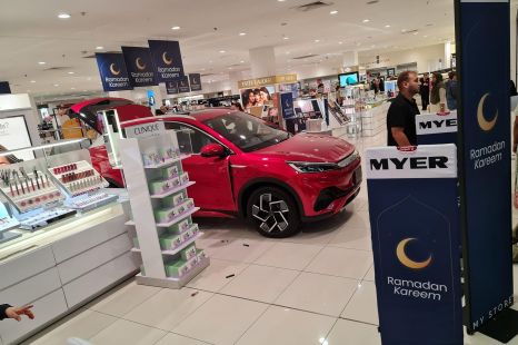 Electric car displayed in shopping centre crashes into store, two hospitalised