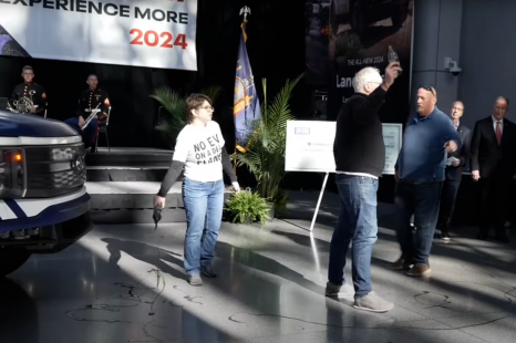 Climate activists protest electric cars at New York motor show