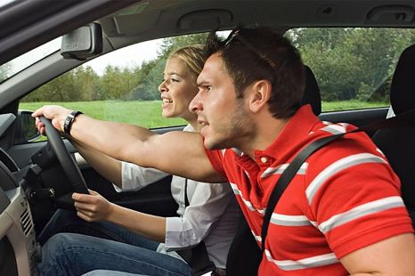 Is it illegal for a passenger to steer your car?