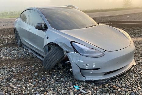Watch as this Tesla almost Full Self-Drives into a train
