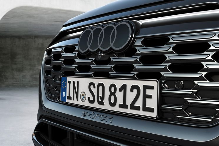 Audi drops chrome from car logos