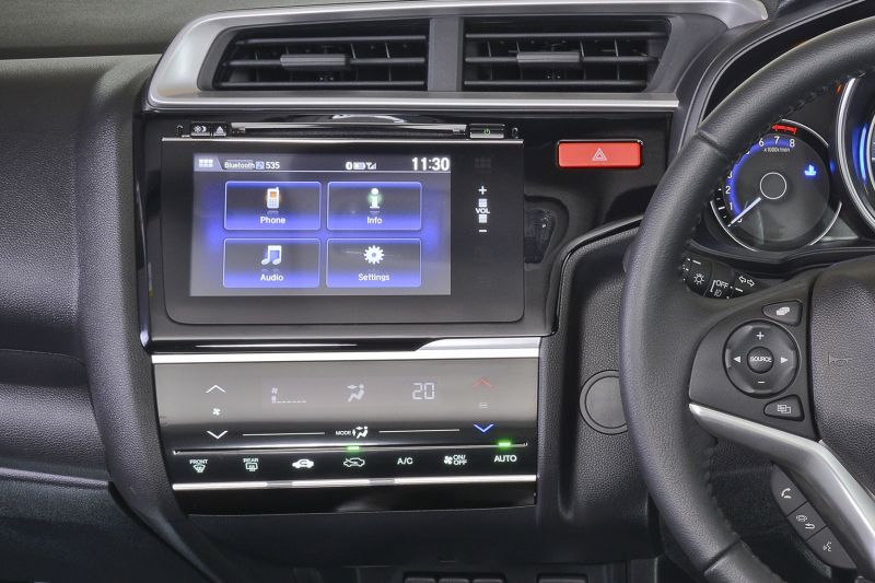 Touchscreens are perfect on a phone, less so in the car