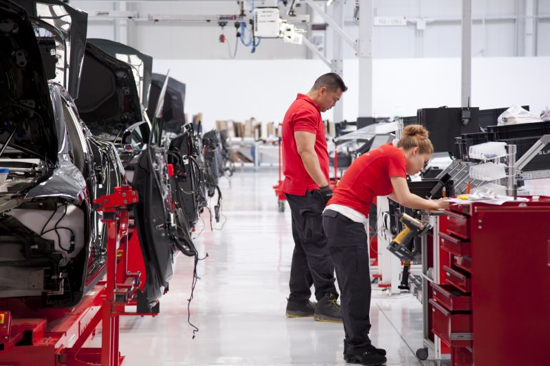 Tesla re-opens California plant against local government orders