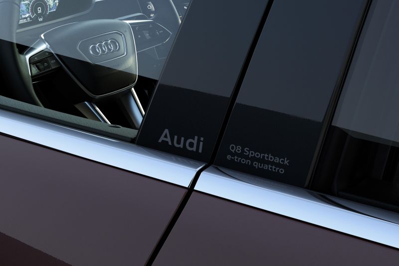 Audi drops chrome from car logos