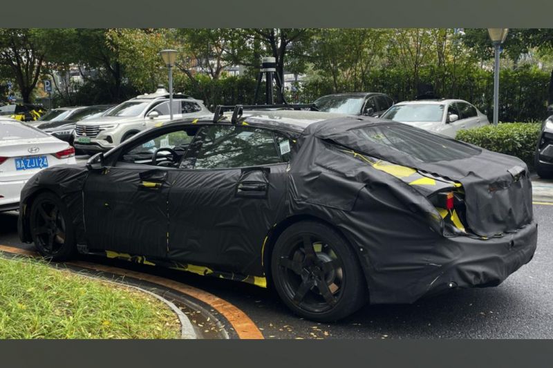 Lotus' new Porsche Taycan rival spied