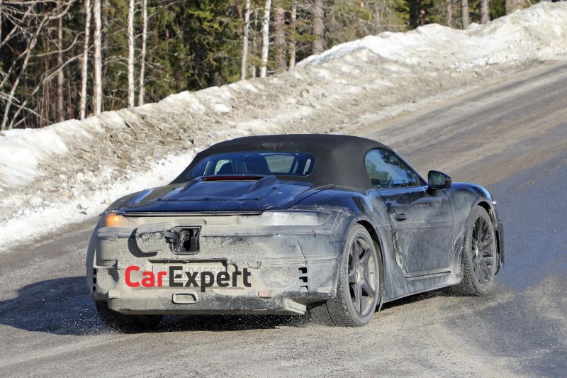 Porsche's first electric convertible spied