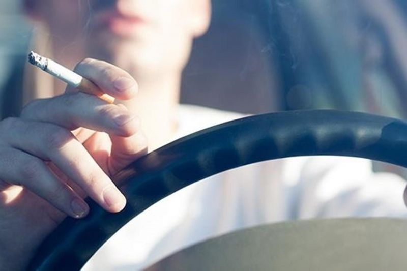 Is it illegal to drive and smoke?