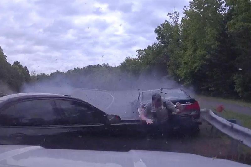 Cop jumps for his life to escape speeding teen in BMW