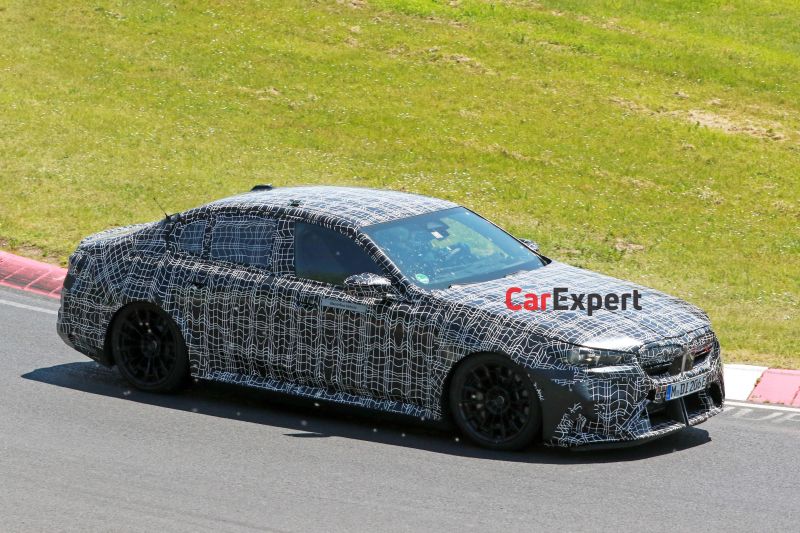 The plug-in hybrid BMW M5 features an aggressive new look