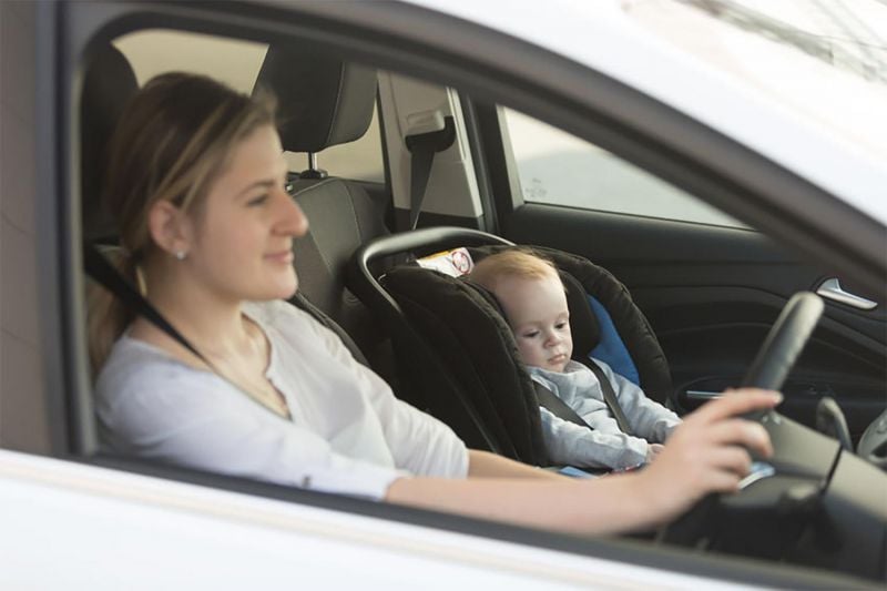Is it illegal to have a child seat fitted in the front seat?