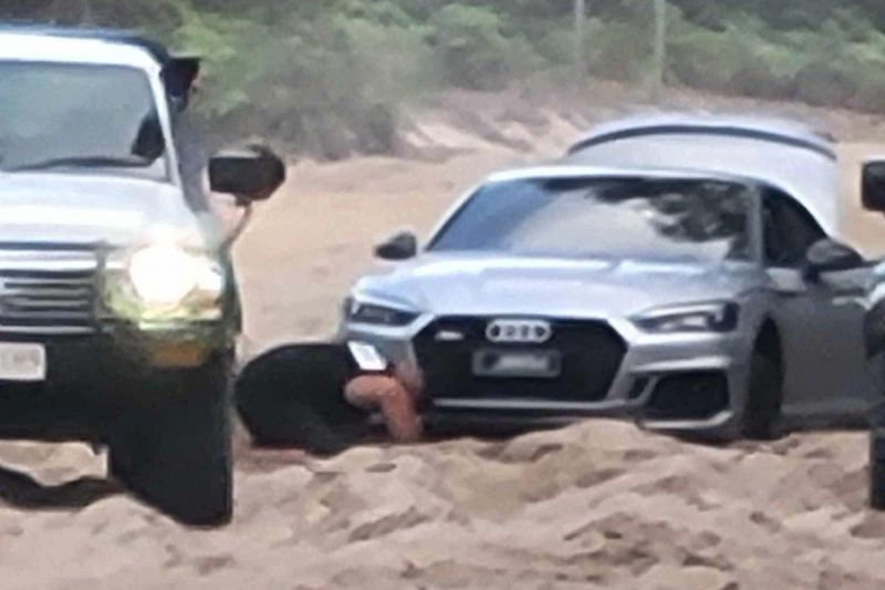 No, quattro doesn't make your Audi RS5 capable of beach driving
