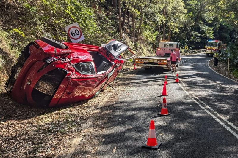 Pair of hot hatches flip on the same iconic Aussie road on the same day