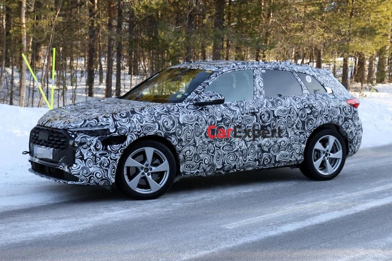 Does the petrol Porsche Macan rebirth begin with this camouflaged Audi?