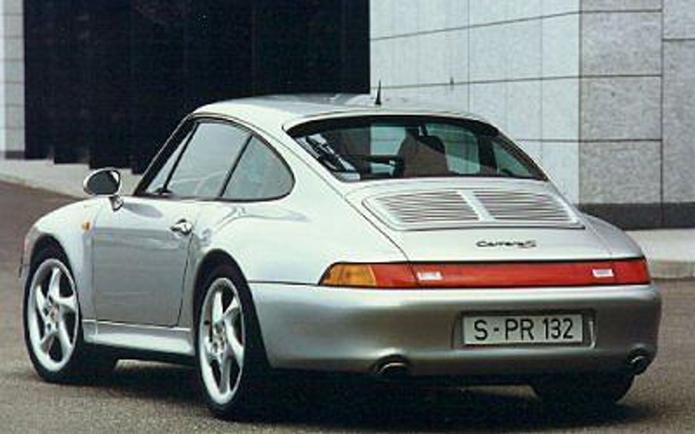 Hero image of a new Porsche 911 Carrera (1998) price & specs available with CarExpert deals.