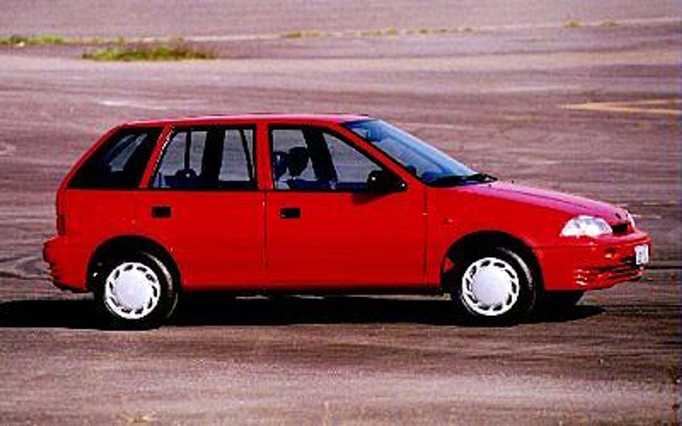 Hero image of a new Suzuki Swift Cino (1997) price & specs available with CarExpert deals.