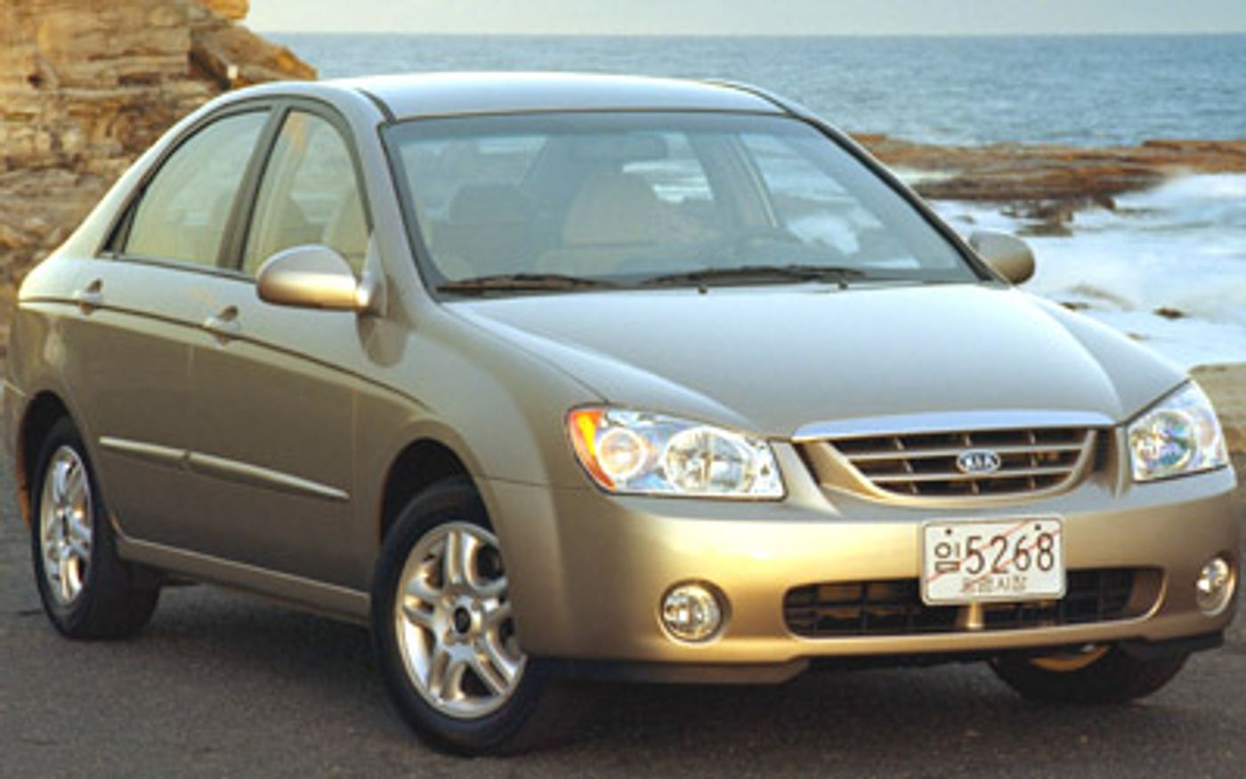 Hero image of a new Kia Cerato EX (2004) price & specs available with CarExpert deals.
