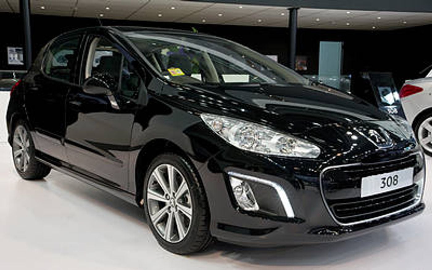 Hero image of a new Peugeot 308 Style (2013) price & specs available with CarExpert deals.