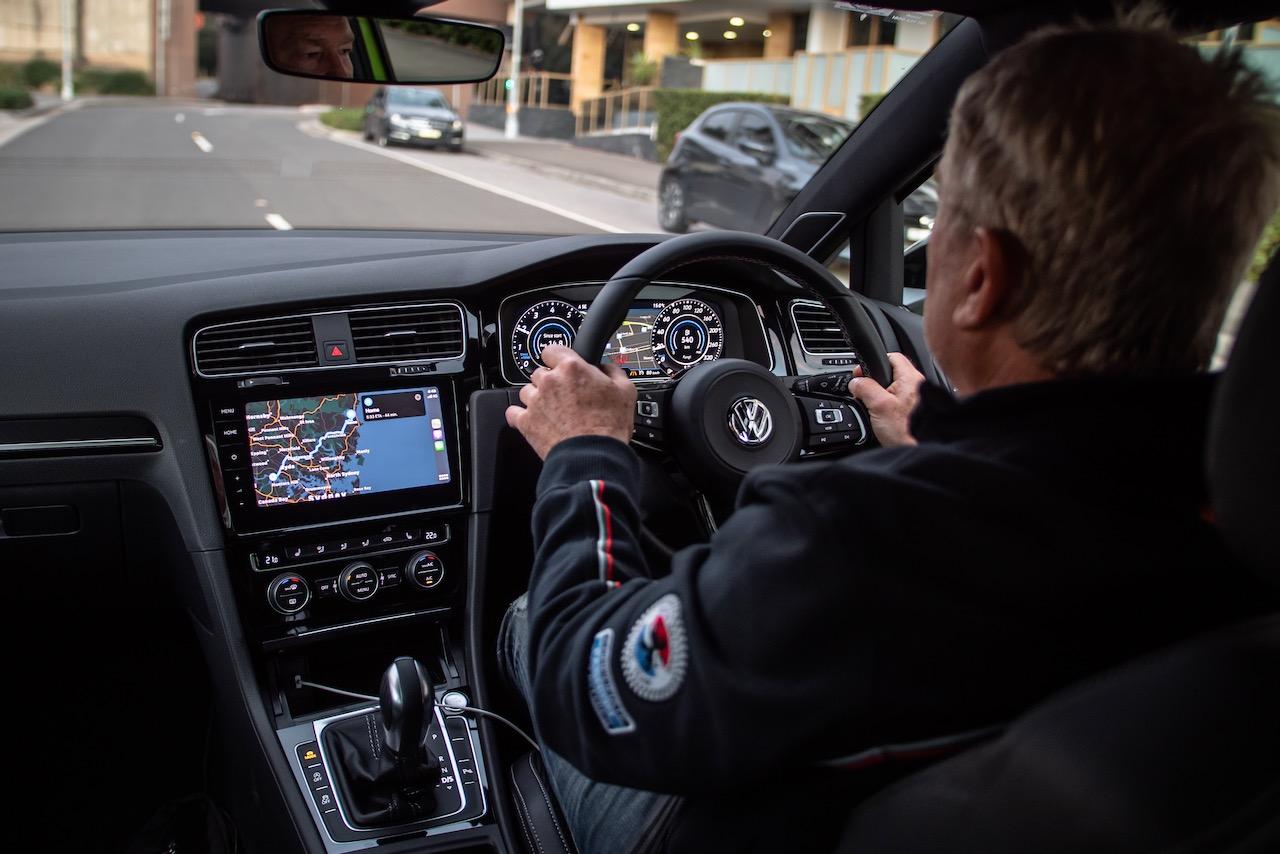 Is wearing earphones while driving illegal? CarExpert