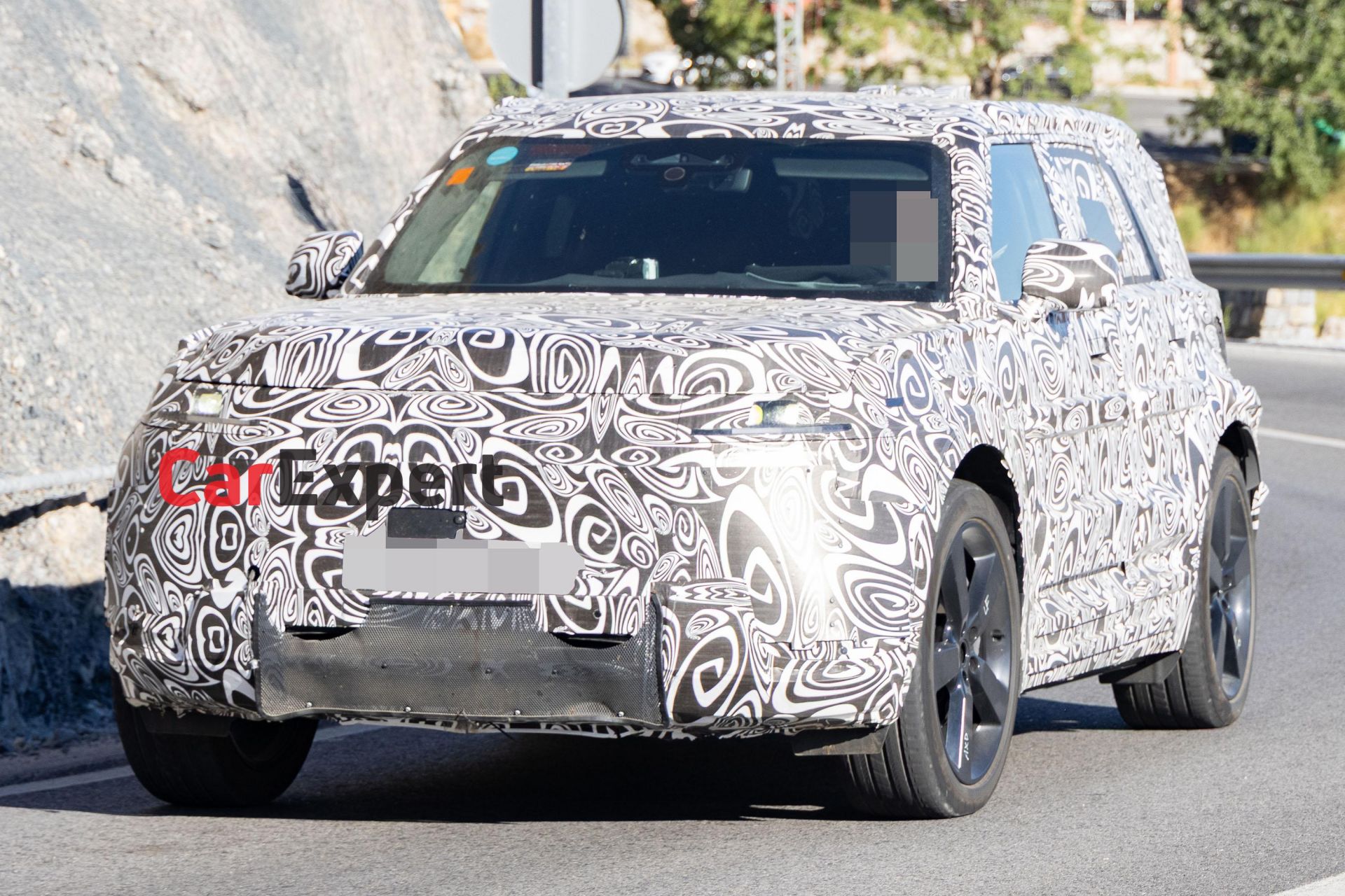 Baby Land Rover Defender spied with electric drivetrain | CarExpert