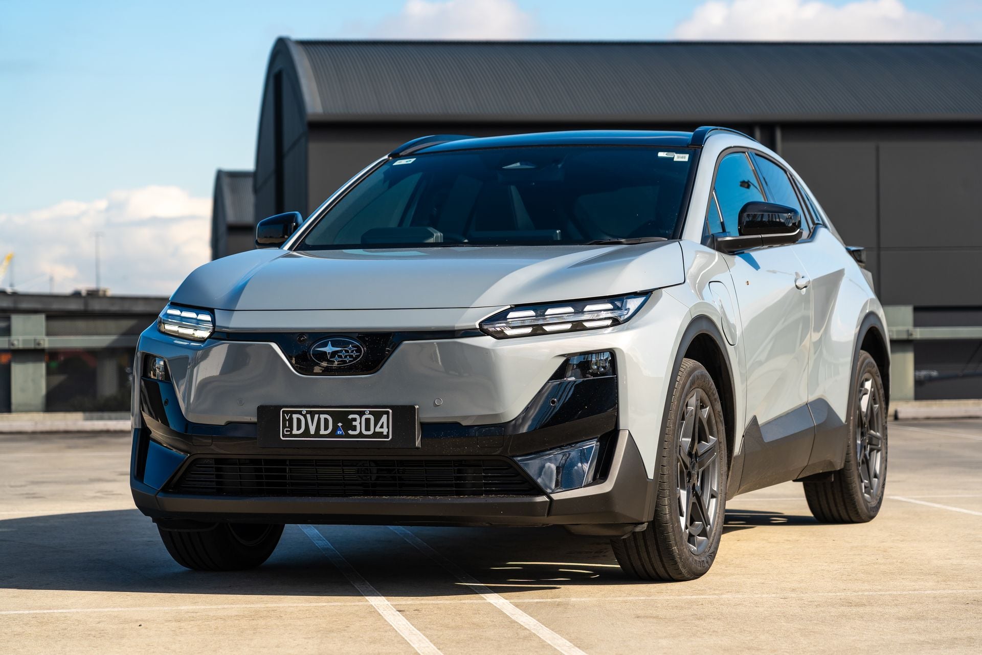 A silver 2026 Subaru Uncharted AWD SUV seen from the front on a rooftop car park