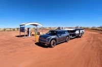 Family towing camper across Australia in an EV to prove ScoMo and doubters wrong