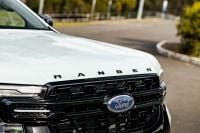 Ford posts $77.6 billion record revenue amid tariff losses