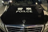 Fake Chinese police car driver busted in Sydney for illegal weapons, impersonating police