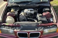 Man caught driving without bonnet and driver's seat now without car