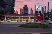 Ampol buys Evie in $225m EV charging network deal