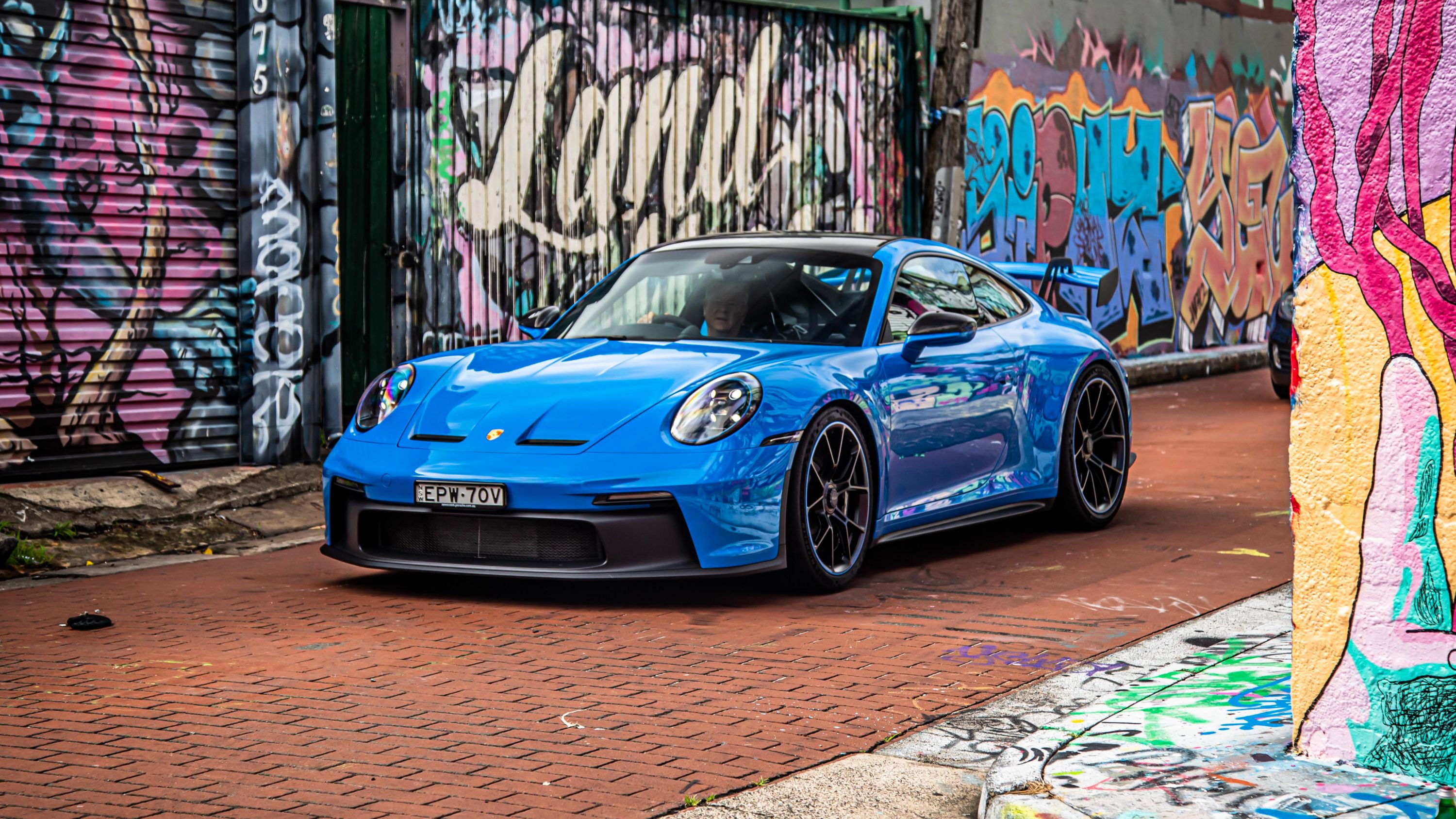 blue porsche car