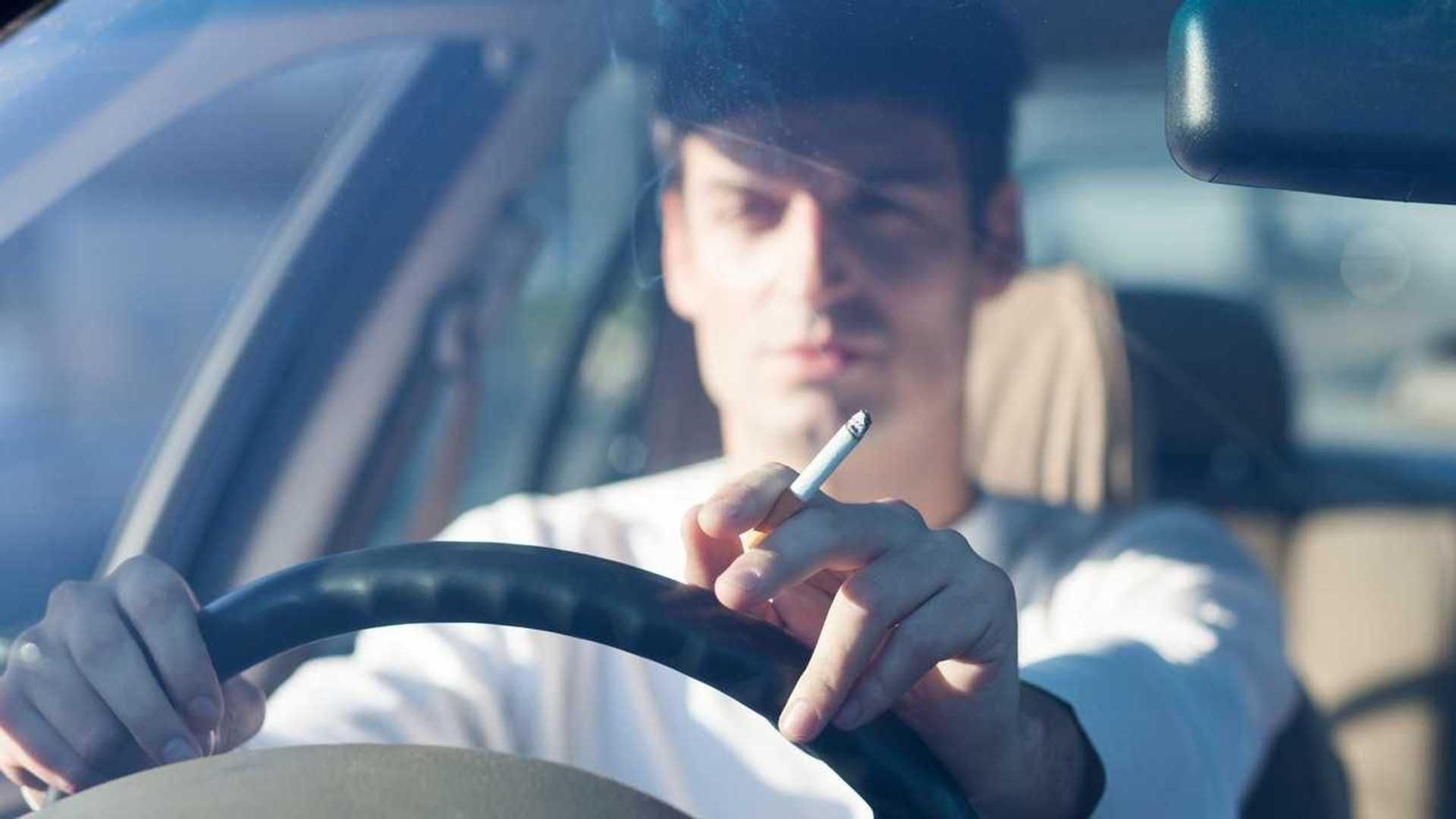 is it illegal to smoke cigarettes while driving in california Is it illegal to drive and smoke?