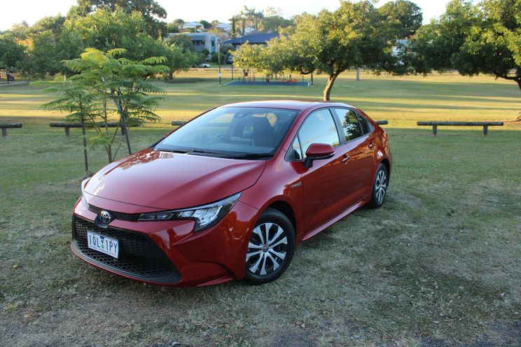 How much does a Toyota Corolla Hybrid cost around the world?