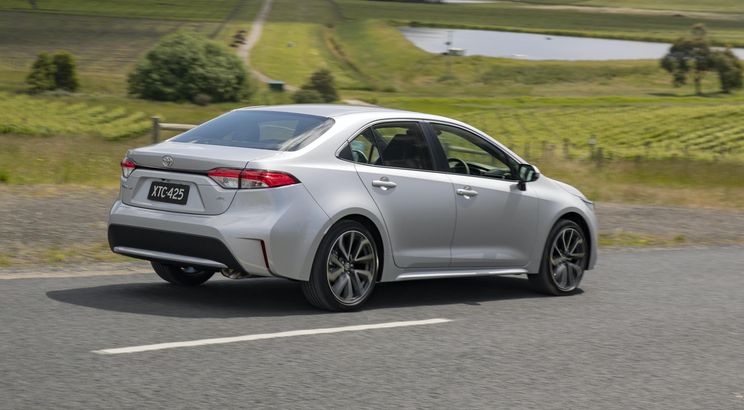 Specs compared: Honda Civic, Kia Cerato, Mazda 3, and Toyota Corolla sedans