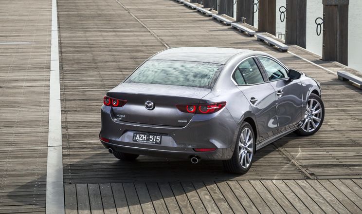 Specs compared: Honda Civic, Kia Cerato, Mazda 3, and Toyota Corolla sedans