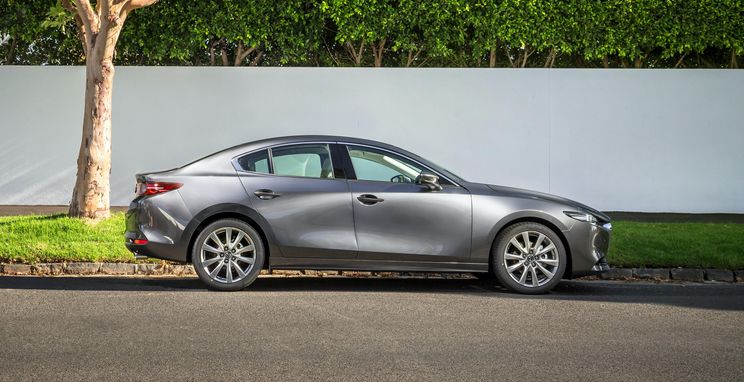 Specs compared: Honda Civic, Kia Cerato, Mazda 3, and Toyota Corolla sedans