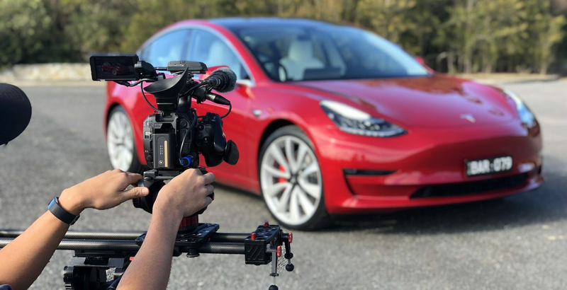CarExpert editorial team filming a Tesla Model 3 review
