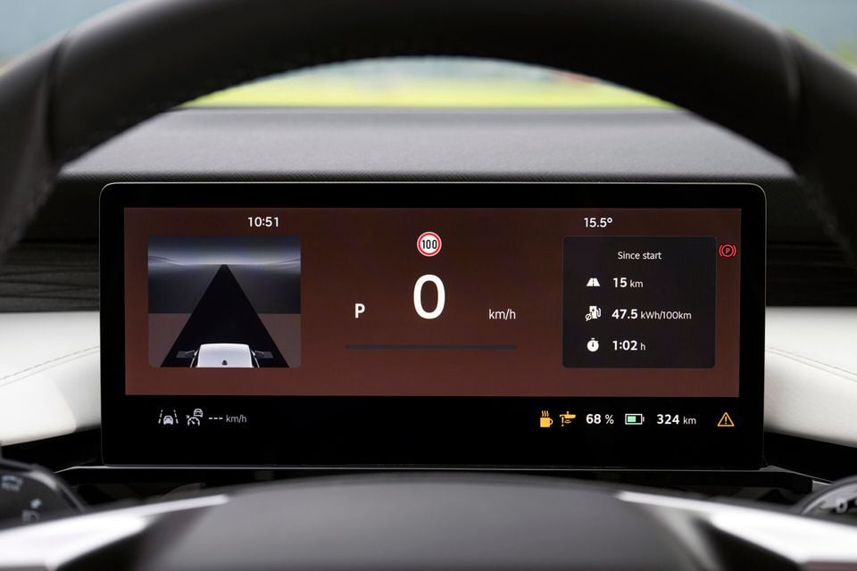 The digital instrument cluster of a Skoda Enyaq showing speed, gear selector, energy consumption stats, battery charge at 68% and 324km range remaining