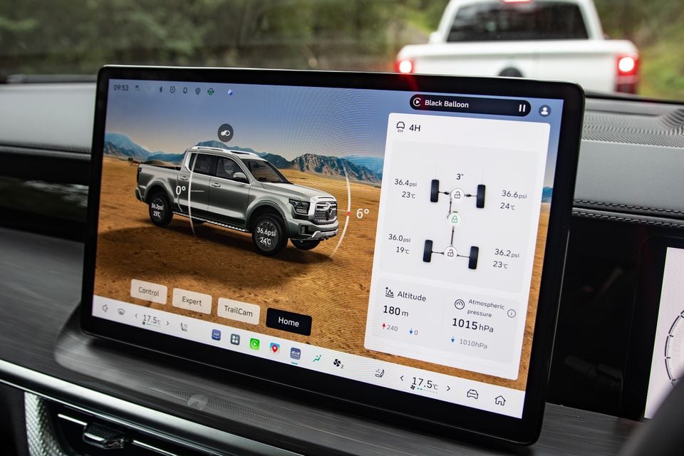 The infotainment touchscreen of a 2026 GWM Cannon Alpha Vanta ute shows an off-road control display with tyre pressures, altitude and terrain camera options.