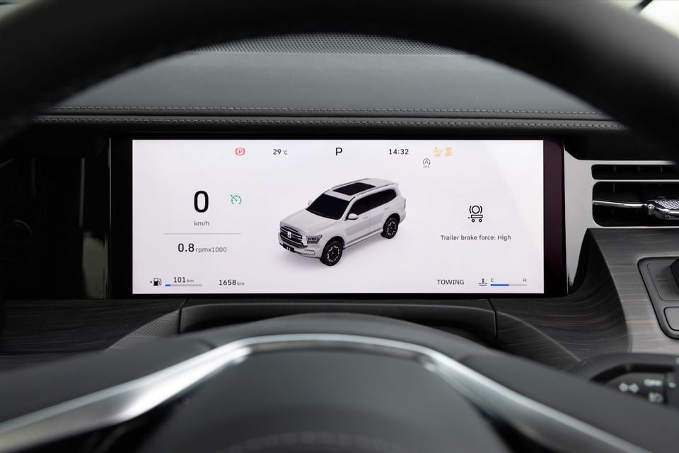 The digital instrument display of a GWM Tank 500 shows a 3D vehicle graphic, speed, gear position and towing information.