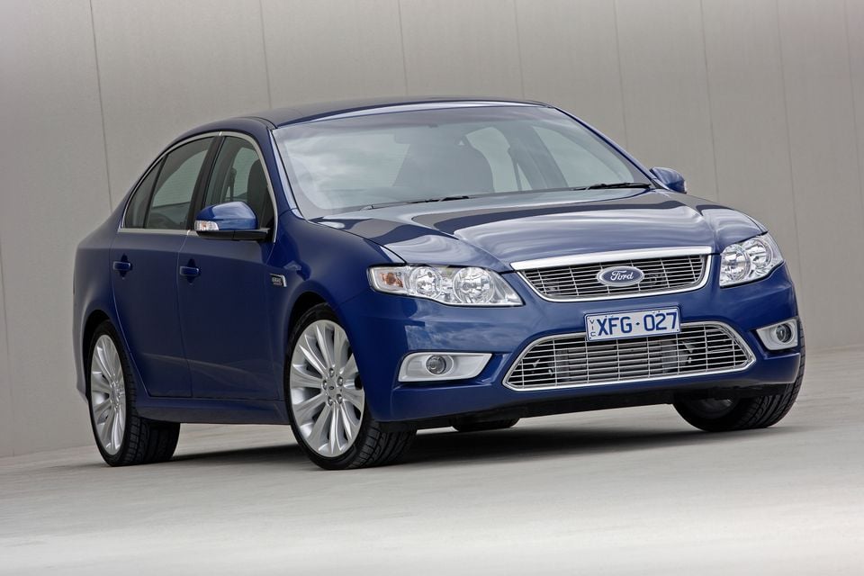 A blue 2008 Ford Falcon G6E Turbo sedan photographed from the front quarter angle in a studio