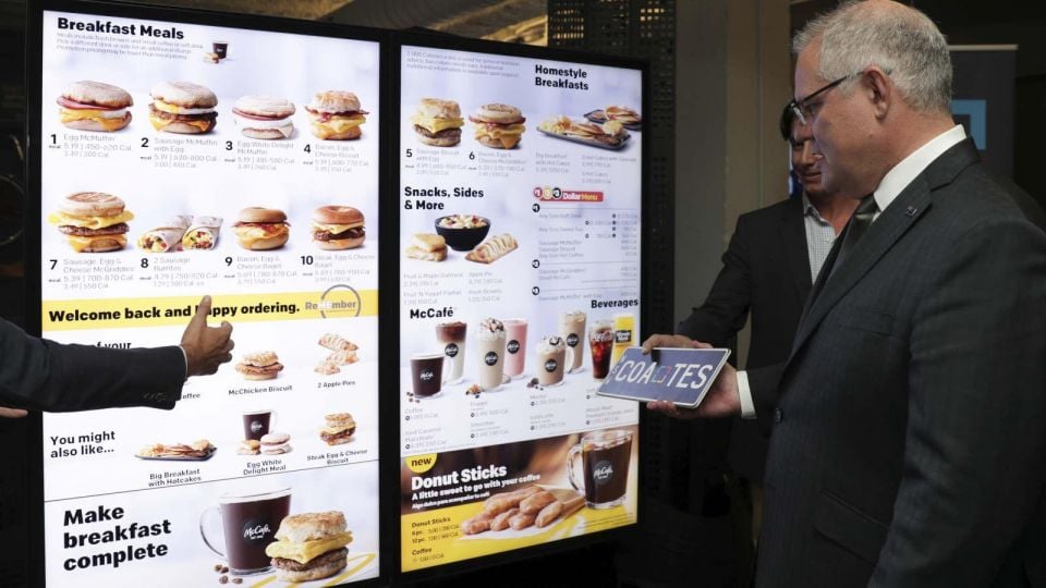 PM Scott Morrison inspects ‘smart’ McDonalds drive-through menu in the USA.Image courtesy Alex Ellinghausen for The Sydney Morning Herald