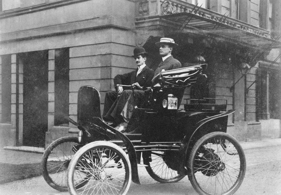 Pictured: Charles Rolls in a Columbia electric carriage