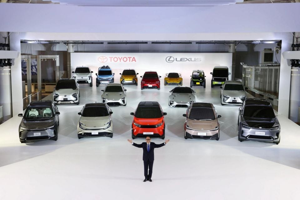 Akio Toyoda in December 2021 with an array of Toyota EV concepts